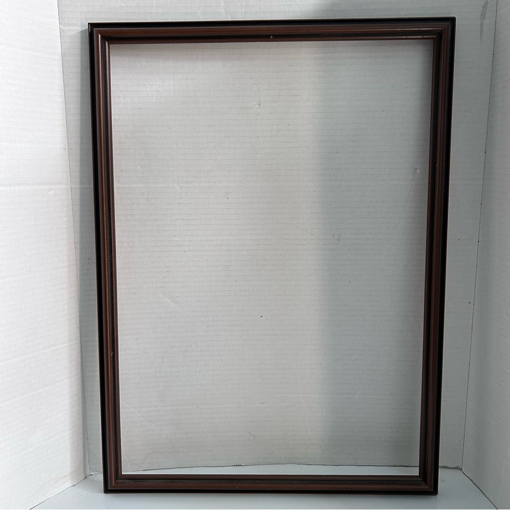 Brown wood frame 22” x 16”